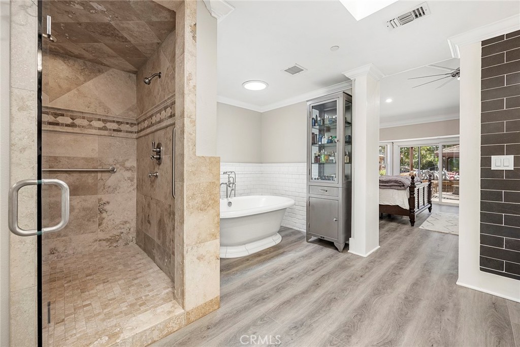 Primary bathroom includes Stand alone Kohler soaking tub & shower with Dual shower heads & 3rd RainFall Shower