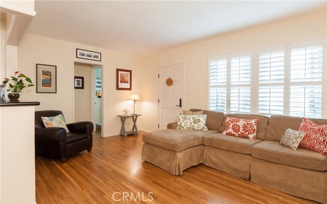 Hardwood Floors and Plantation Shutters Throughout