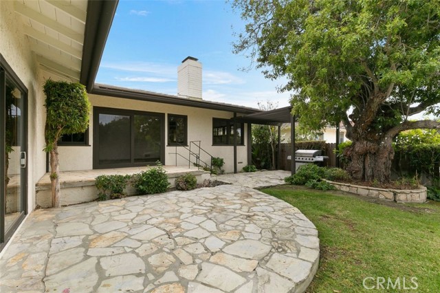 PV stone patios off of the living area and the family room.