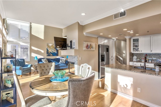 The dining room is open to both the kitchen and the living room.