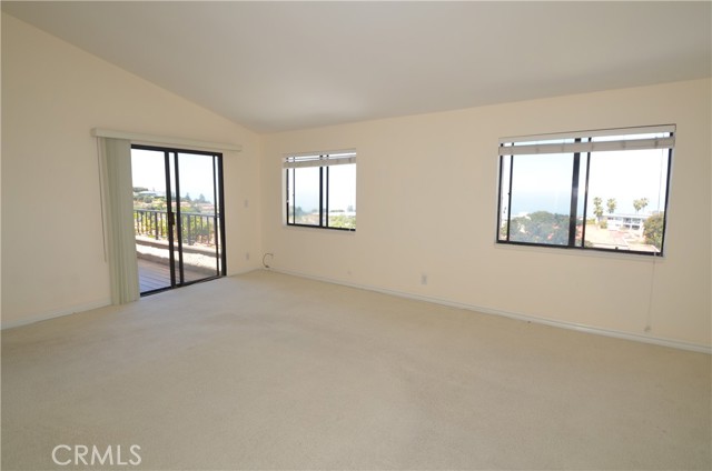 Huge master bedroom with 2 large windows, sliding door and a balcony for enjoying the Panoramic ocean view Huge master bedroom with 2 large windows, sliding door and a balcony for enjoying the Panoramic ocean view