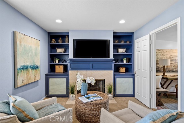 Fireplace and builtins of sitting area in Owner's Suite