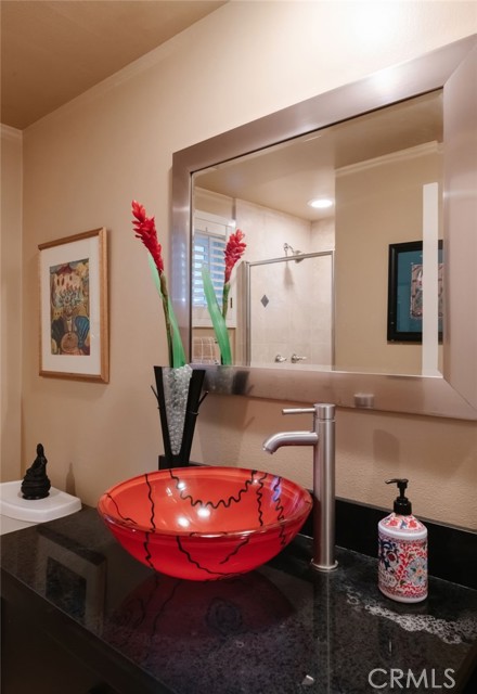 Downstairs bathroom/shower with custom vessel sink