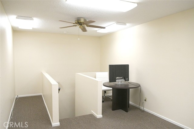 Upstairs office space view facing stairs
