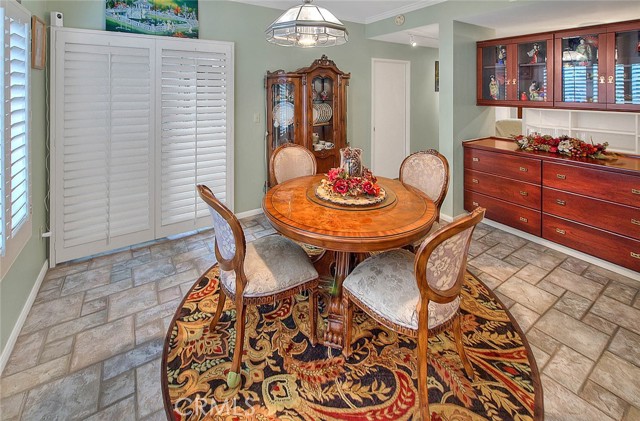 Dining Room & China Cabinet.  Easy Care Tile Flooring