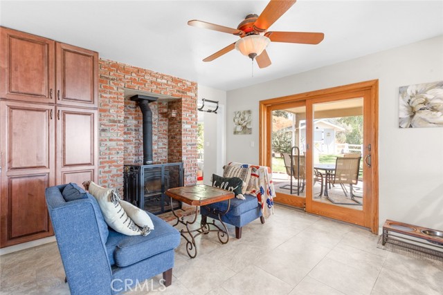 family room with wood burning stove