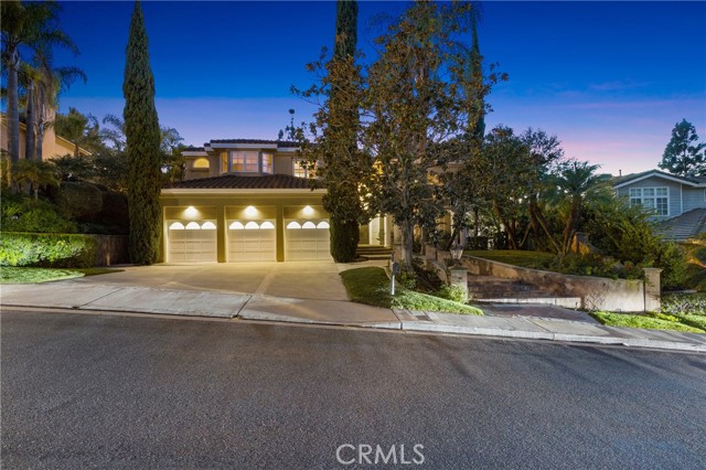 Nestled in the picturesque Anaheim Hills, this stunning property spans an impressive 3,741 square feet and provides effortless access to an array of sports facilities, cultural attractions, and a vibrant food and beverage scene. Boasting four spacious bedrooms and three and a half luxurious baths, this home presents a remarkable opportunity to transform it into your personal dream oasis or an extravagant mansion. Step outside to discover the expansive hardscape back patio, which features a sparkling pool and a vast entertainment area, making it the ultimate destination for both relaxation and social gatherings. Whether you’re hosting a summer barbecue, enjoying a quiet evening by the pool, or celebrating special occasions with friends and family, this outdoor space is designed for enjoyment. In addition to its generous living space, the property includes a sizable 741-square-foot three-car garage, providing ample storage and parking options. With its combination of luxurious features and prime location, this Anaheim Hills residence is a rare find that promises a lifestyle of comfort and elegance.