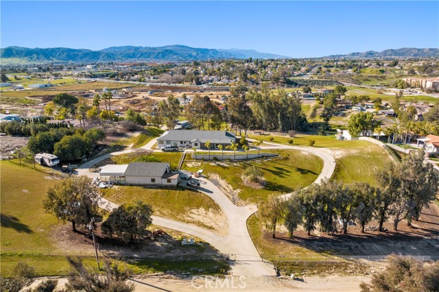 Excellent development opportunity for mixed-use commercial in the heart of Murrieta located between two freeways Hwy I-15 & Hwy 215. Prime location, surrounded by ongoing development, medical offices, shopping centers & easy freeway access. Sale includes APN#s 949-180-025 AND 949-180-023. PROPERTY HAS A HOME AND UTILITIES (Well, Septic, and Public Electricity) and sits on top of 4.58 acres with an existing 2,788 sq. ft. single family home built in 1983 with 3 bed, 3 baths, and indoor swimming pool. Beautiful views of hilltops and mountains, and has a huge detached  workshop. Property is all fenced. This property is currently occupied and being sold "As Is" Great investor opportunity. Currently Zoned for office with "TRANSIT ORIENTED HIGH DENSITY OVERLAY" The future Potential Development includes "DENSE HOUSING/MULTIFAMILY AND OFFICE.
VALUE IS IN THE LAND! Perfect location for a new Church or School. Buyer and Buyers Broker/Agent to verify all information through due diligence.
See Supplements for additional information.