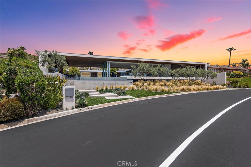 An architectural tour de force located within the ultra-premier southern California beach community of Irvine Cove, a sought-after enclave acclaimed for its exclusivity and pristine sandy beach. The home, designed by renowned Horst Architects, deftly blends mid-century lines with contemporary stylings. Simplicity makes a bold statement with the clean white box framing the home. The entry sequence for this home is dramatic with steps ascending along the infinity edge pool, leading to a spacious outdoor dining area accented with an extended linear fire feature, followed by steps over the pool via floating concrete pads, then approaching the large pivot entry door.

Oversized sliding glass doors pocket completely away to dissolve the physical boundaries between interior and exterior, creating an uninterrupted flow from the central courtyard through the main living space to the pool area, all against the panoramic backdrop of the Pacific Ocean. Massive walls of cast concrete are a counterpoint to the structure's strong horizontal lines, imbuing the house with strength and permanence.  

The heart of the home is adorned with a gourmet kitchen with Gaggenau and Bosch appliances, complete with a separate prep kitchen, perfect for culinary enthusiasts. The open concept great room seamlessly combines the kitchen, family, and living room, creating an inviting space for relaxation and entertainment, surrounded by ocean vistas and the luxurious infinity edge pool. The dramatic primary suite is a true sanctuary, with sliding wood privacy shades, an opulent fire feature, and a luxurious bathroom with a massive, oversized shower area with a glass ceiling for moments of pure tranquility. For health enthusiasts, there is an indoor/outdoor gym area with an  adjacent sauna and steam shower.

Located in the northernmost end of Laguna Beach, Irvine Cove is a 24-hour guard-gated community of approximately 110 homes. Residents of Irvine Cove enjoy association tennis courts, an oceanfront park and private access to the spectacular Irvine Cove Beach.