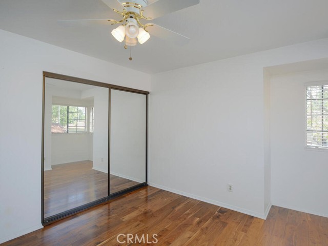 Upstairs bedroom with mirror wardrobe doors