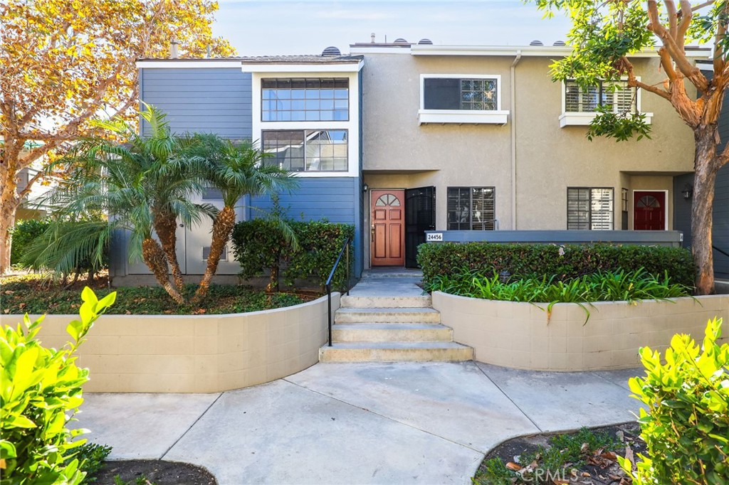 Nestled within a tranquil, Gated community in Laguna Niguel, this rare 2-bedroom, 3-bathroom gem perfectly blends comfort, style, and resort-like living. With both bedrooms boasting their own en-suite bathrooms, this thoughtfully designed two-story home provides privacy and convenience, making it an ideal retreat.

Step inside and be welcomed by modern laminate flooring, soaring ceilings, and oversized windows that bathe the space in natural light. Whether you prefer a sunlit interior or a cozier ambiance, the faux wood blinds throughout allow you to create the perfect atmosphere. The open layout is perfect for entertaining, centered around a sleek, contemporary kitchen featuring stainless steel appliances that combine functionality with style.

As an end unit, this home offers additional privacy and charm. The detached 1-car garage, along with an open parking space with a placard, ensures convenience and extra storage options. The surrounding lush landscaping, adorned with vibrant Birds of Paradise and fragrant white roses, creates a warm and inviting atmosphere from the moment you arrive.

For those who love the outdoors, you're just a quick 10-minute drive from some of Southern California’s most exotic and secluded coves and beaches. Plus, easy access to main freeways ensures you're perfectly positioned for both relaxation and convenience.

Experience the ultimate combination of modern living, stunning surroundings, and unbeatable location. This home is a rare find and truly one-of-a-kind. Don’t miss your chance to call it yours!