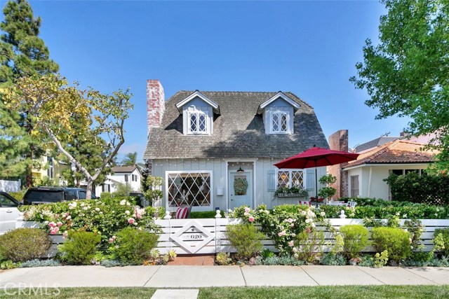 620 Orchid Avenue Corona del Mar, California This remodeled and expanded front-unit is unlike any other in the Village! Located on a sunny corner, natural light fills this casual yet elegant home. With thoughtfully selected finishes throughout, the modern amenities along with classic design are sure to please those with the most sophisticated taste. As you enter through the charming white picket fence, you walk into a tranquil front yard perfect for enjoying al fresco dining. The custom Dutch Door entry gives this home the quintessential CDM feel. A wide galley-style gourmet kitchen features a professional Bertazonni 5-burner range, Sub Zero refrigerator, Bosch dishwasher and marble countertops. The expanded upper level includes two spacious secondary bedrooms and a new master suite with soaring 14’ ceilings, a private balcony and elegant master bath complete with Italian Blue Stone counter tops and large walk-in shower with Carrera marble and subway tile accents. Other upgrades in this gorgeous home include hardwood floors throughout, energy efficient Mitsubishi split AC and heat system, and a tank-less water heater. The attached garage has custom flooring, abundant storage and laundry sink. No detail has been overlooked. This home is perfect for those who enjoy the coastal lifestyle.