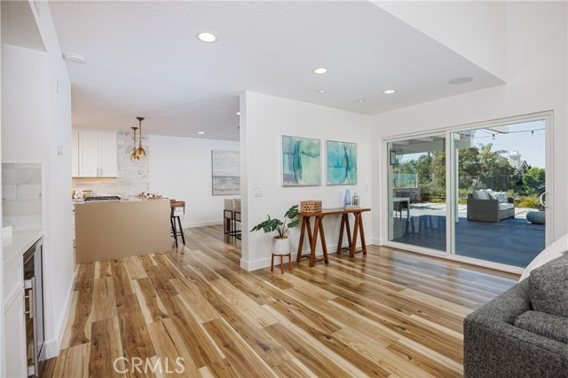 Family room opens to kitchen and dining area