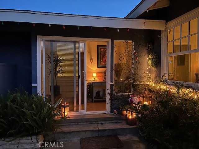 Night shot from the English garden into the entrance foyer