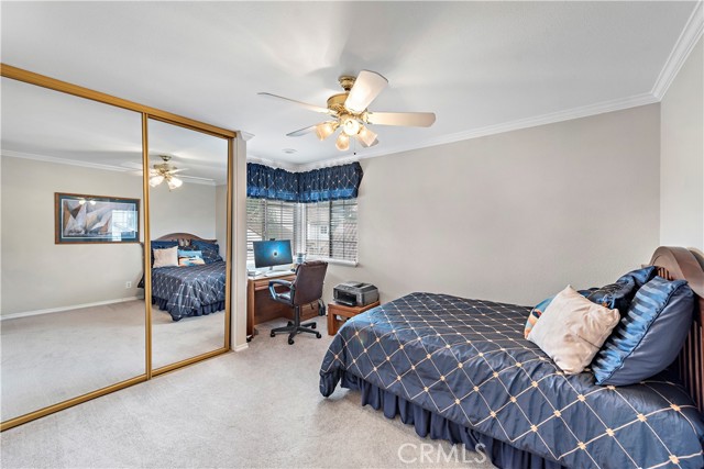 Guest bedroom with front window.