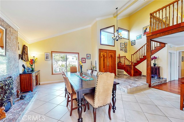 Vaulted ceilings at entry way, living room and formal dining area.