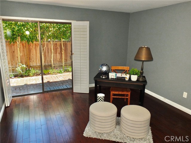 A view of the back patio from the 2nd bedroom