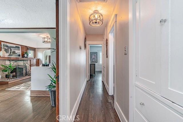 Hallway to primary bedroom