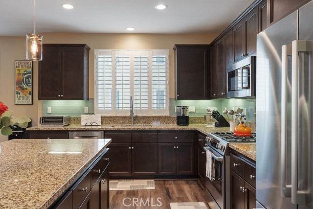 Stainless appliances, granite counters, and updated fixtures