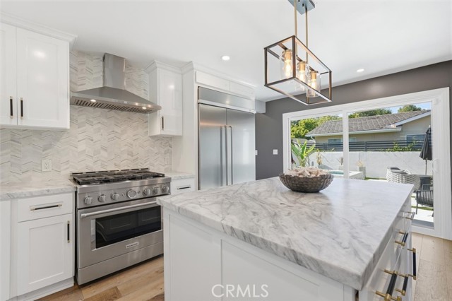 View from kitchen to pool and entertaining