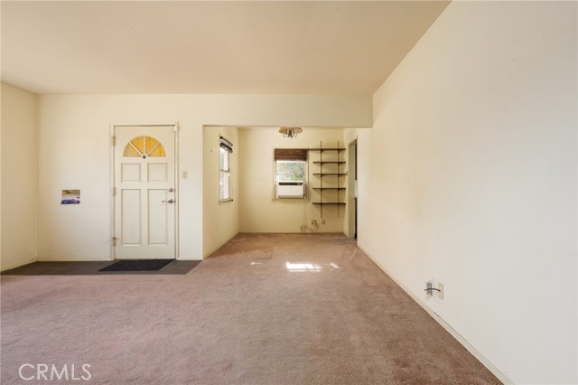 Living room open to dining room