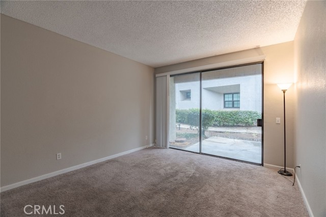 Bedroom also has a sliding door to patio