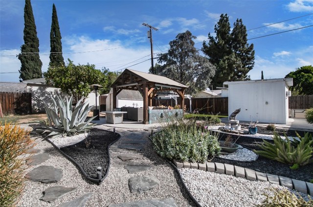 Welcome Home & Relax on the Tastefully Hardscaped Backyard