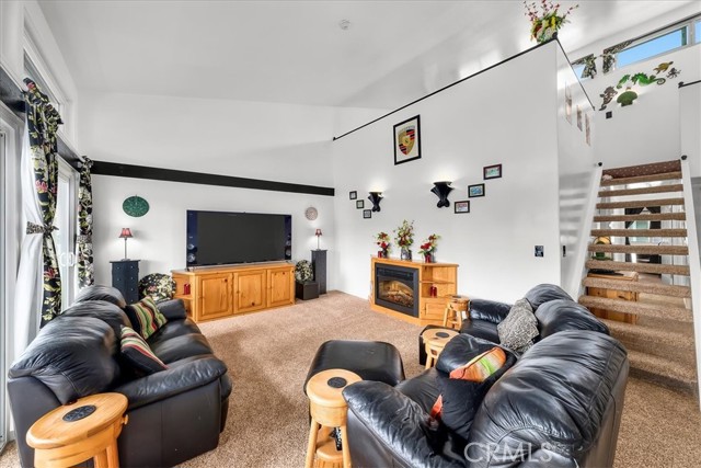 Living Room with stairs to loft