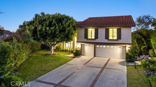 Driveway can hold 6+ cars plus a 3 car garage