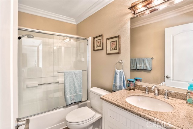 The upstairs hallway bathroom is remodeled and has a shower tub combo.