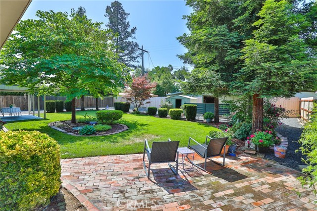 Walk outback beautiful trees and plants! And there is more storage space out here!