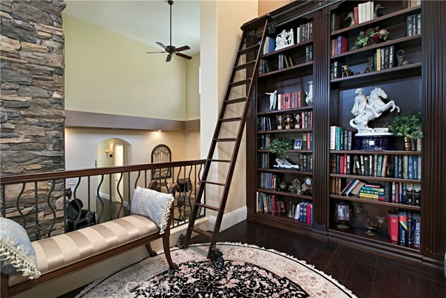 The library has a rolling ladder for all your favorite books!