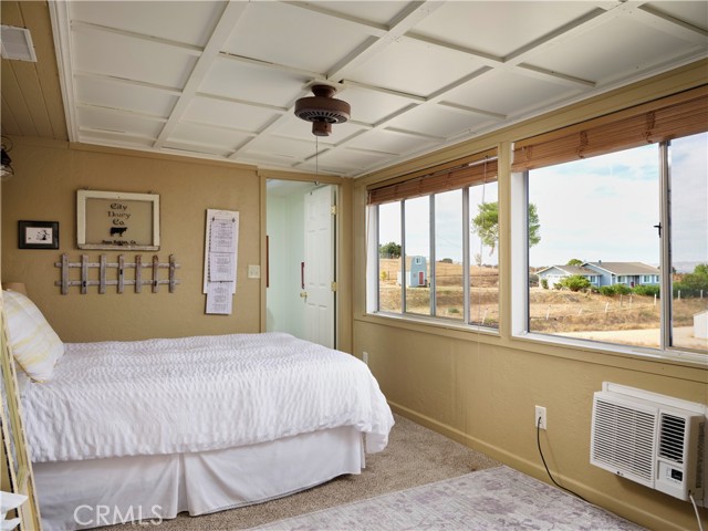Air BnB bedroom has views of the vineyards and hills