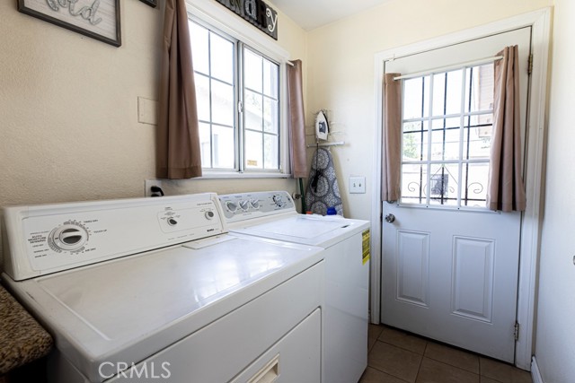 Laundry room (connected to the kitchen with access to backyard)