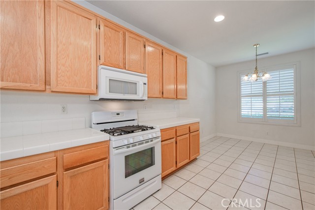 Kitchen range and microwave.