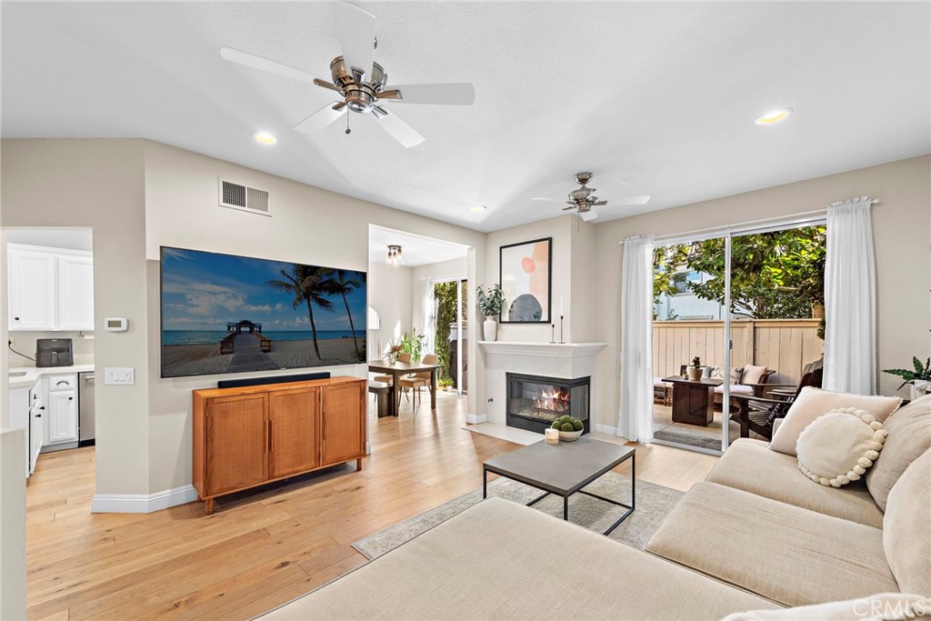 Experience coastal living at its finest in this gorgeous two-bedroom, two-and-a-half bath customized home situated in the sought after neighborhood of Marina Hills. The stunning remodeled kitchen with white cabinets, quartz counters & backsplash, new appliances, custom lighting and French Oak floors throughout the lower level awaits you as you enter this beautiful abode. The kitchen opens to an oversized eating area and family room complete with a gas burning fireplace and dual sliders that seamlessly connect your indoor living to your own lush outdoor oasis. Featuring low maintenance landscaping, the patio is perfect for hosting barbecues or simply relaxing. This home backs up to the neighborhood greenbelt, offering incredible privacy. Head upstairs to find two primary en-suites boasting high ceilings and an abundance of natural light along with their own spacious private baths. Enjoy loads of extra storage space thanks to a separate indoor laundry room equipped with full size washer/dryer. The laundry room opens to the spacious 2 car garage with lots of overhead storage racks! This move-in ready home is gorgeous and has newer AC, hot water heater, and has already been re-piped.  This house truly has it all, from close proximity to local 

parks, 4 tennis courts, 2 pickleball courts & baseball fields as well as access to Salt Creek Trail where you can bike or walk straight down to the beach. Enjoy resort style amenities such as Junior Olympic-sized pool & spa, barbeque area & more right within your own community! Don't miss out on this one-of-a kind opportunity--it won't last long!