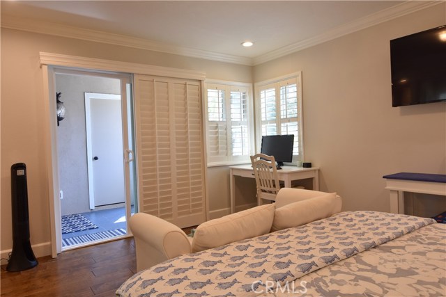 Master bedroom with direct access to the private patio. Work station with a view