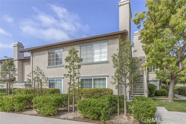 37 Exeter 23 Irvine, California Highly upgraded, private, single level, upstairs, end unit condo available in the peaceful Columbia Square community. The home is walking distance to shopping, restaurants and the University. Upgrades include modern grey laminate flooring in the living room, dining room, hallway and bedroom. The bathroom and kitchen offer a contemporary design aesthetic that features solid surface counter tops, updated cabinetry and natural stone. The enclosed laundry room is situated off of the kitchen and includes a full size washer and dryer. The kitchen boasts stainless steel appliances; including a refrigerator, built-in microwave and gas range. Ample storage throughout. Relax and enjoy the view from your private balcony overlooking green space, a basketball court, a playground, a volley ball court, and a gated pool/spa. The property has two covered side-by-side parking spaces (very close to the home), both with storage lockers. Location, green space and privacy - this one won't last!