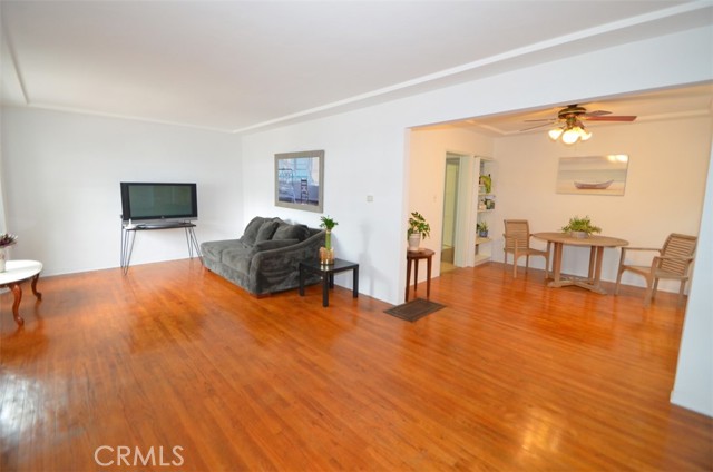 Another shot of the ground floor unit showing the dining area as well as  the living room.