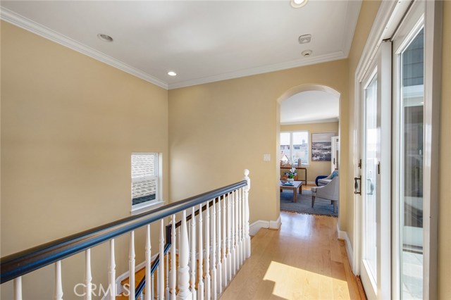 Top of staircase and entrance to living room.