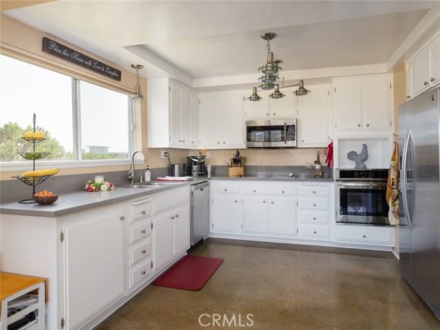 Spacious kitchen with large windows to let the light in!