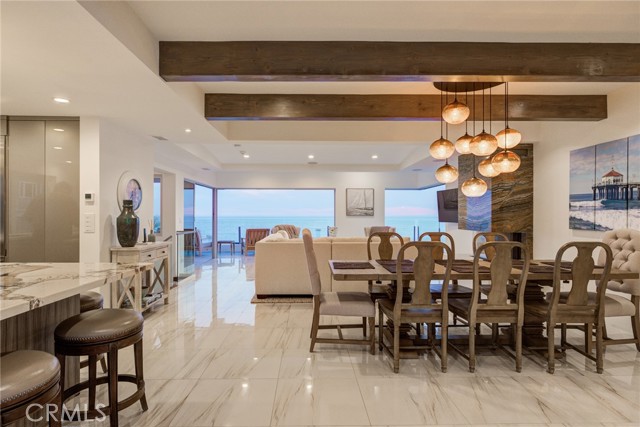 Looking West  with kitchen, dining area, living room and ocean