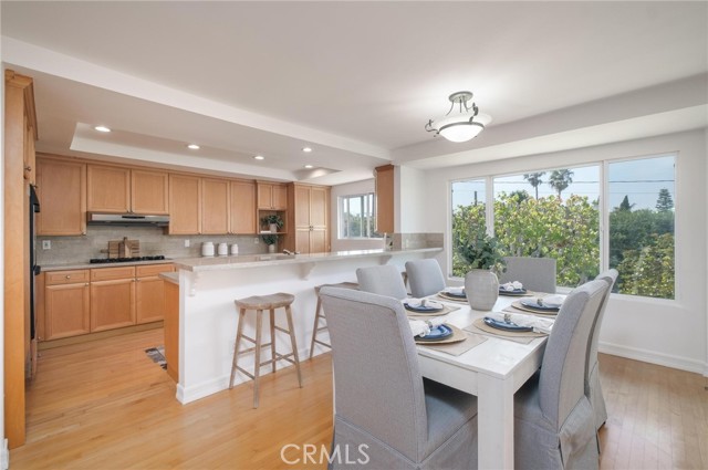 Large open kitchen with inviting dining room.