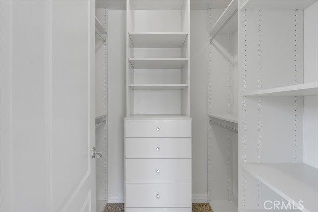 Walk-in closet with bedroom 2