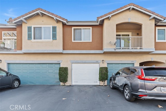 Bright and spacious home in the beautiful Manzanita Walk community in the heart of Anaheim! The open-concept first floor features a kitchen with ample counter space, a pantry, and an elevated bar, plus a dining area that opens to a private patio, a living room, a laundry room, and a guest bathroom. Upstairs, the primary suite boasts two large closets and a spacious ensuite. Two additional bedrooms offer plenty of closet space and share a full bathroom, plus there’s hallway storage for added convenience. The attached one-car garage is extra deep with loads of storage space, and the home includes two additional parking spaces. Smart features include keyless entry, thermostat, and smoke/carbon monoxide detectors. All appliances are included: fridge, kitchen appliances, washer/dryer, deep freezer in the garage, and patio grill. Located in a gated community with LOW HOAs and minutes away from Disneyland, Anaheim Packing District, Angel Stadium!