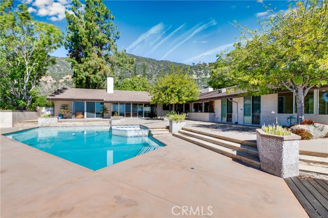 Welcome home to a sophisticated 5 bath, 4 bedroom, 4,064 sq ft home in the grand hills of Arcadia, within hiking distances to the foothills. Located on a quiet street surrounded by serene mountain views, this stunning home has excellent curb appeal and is set on an expansive 15,933 sq ft lot. Custom marble flooring and expansive windows bring elegance and light throughout the home. The open-plan living, dining, and kitchen flows out to a tranquil backyard sanctuary, facing the pool and a 270 degree mountain and breathtaking city views. The striking fireplace in the formal living room shows off the grandeur of this home. The chef’s kitchen features custom wood cabinetry, stainless steel appliances, a large island, custom bar and ample space to entertain. All bedrooms boast large closet.

here is the matterport 3D to include as well. 
https://my.matterport.com/show/?m=DS86WU7tcMg