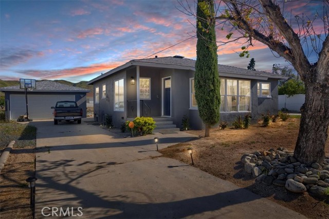 33072 Avenue D Yucaipa, California Welcome to 33072 Avenue D located in the highly sought after quaint city of Yucaipa. These gems (emphasis on the S) have been recently rehabbed, here you will find 2 homes on a single lot with a separate 2 car garage. As soon as you step foot into the main house you will notice the new natural wood color laminate floors throughout. This home offers 3 spacious bedrooms, 1 bath and a remodeled kitchen with white shaker cabinets with quartz counter tops with a custom backsplash. The back dwelling offers 1 bedrooms, 1 bath with it's own driveway entrance and fenced yard. Some of the other features are new plumbing throughout main house, new central AC/heating, flooring & paint, RV/boat potential. Truly a great opportunity if you are looking for a great ready to move in home that offers rental income.