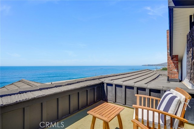 Private upper level deck with prime coastline views.