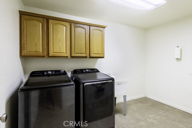 Indoor laundry with gas & electric for dryer