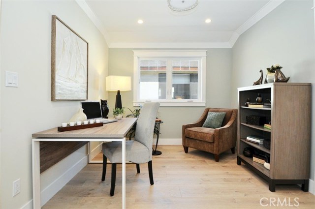 One of the bedrooms is staged as an office